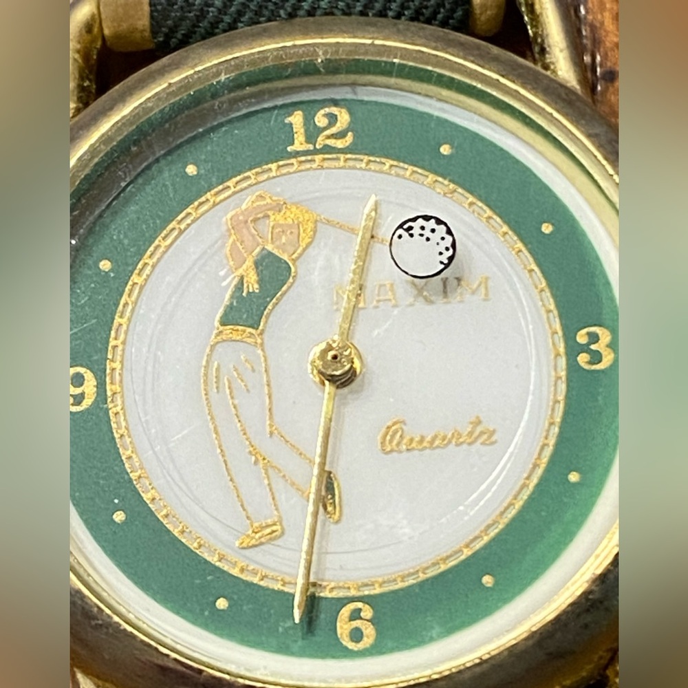 Maxim Quartz golf watch.‎ Japan movement.  The golf ball moves as second hand.